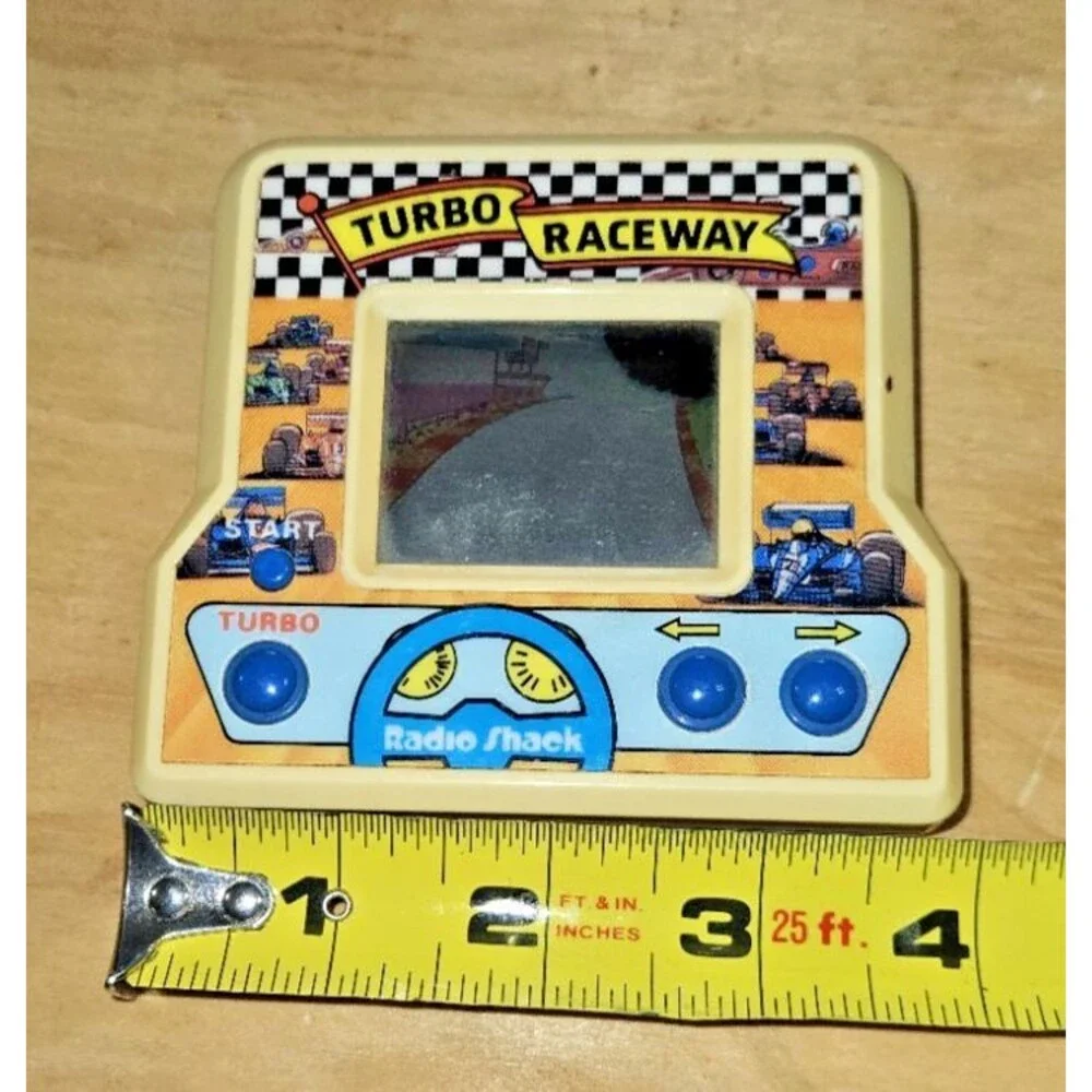 VINTAGE ELECTRONIC HANDHELD TURBO RACEWAY GAME RADIO SHACK TESTED + WORKS